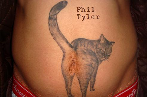 cat tattoo on belly. cat butt elly tattoo